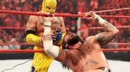 Rey shving Punk's hair after winning the match.
